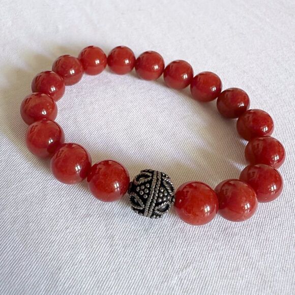 10mm rust jade stretch bracelet with 11mm Tibetan silver spacer. - Picture 4 of 4